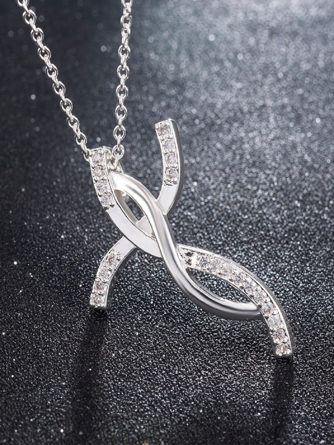 

OOMPH Silver-Toned CZ-Studded Delicate Infinity Shaped Pendant with Chain