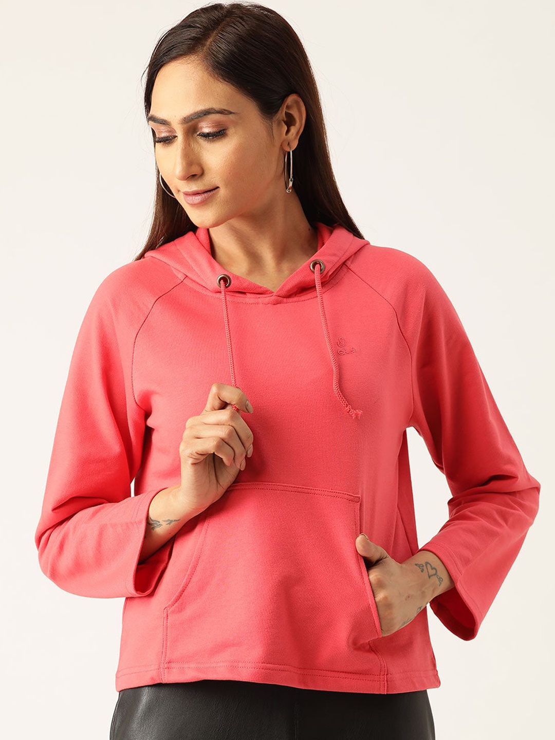 

Laabha Women Coral Pink Hooded Solid Sweatshirt
