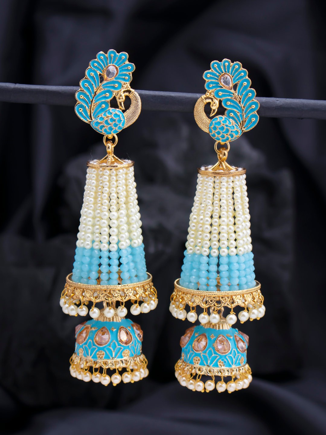 

Sukkhi Blue & White Peacock Shaped Jhumkas