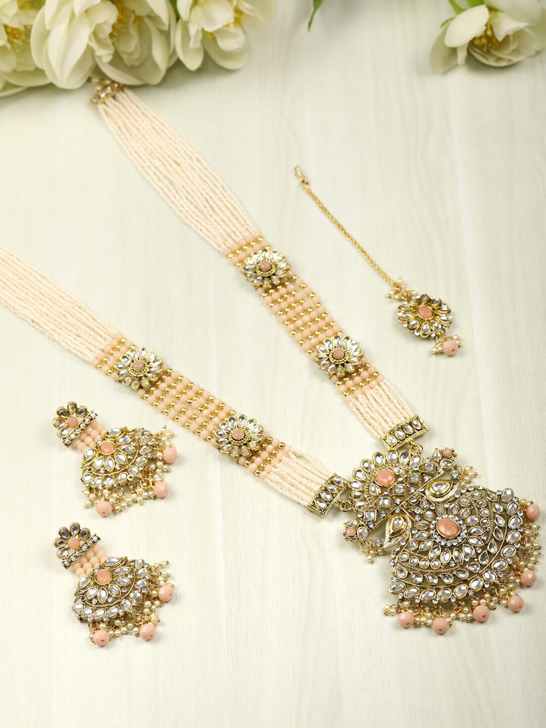 

Priyaasi Peach-Coloured Gold-Plated Kundan-Studded & Beaded Handcrafted Jewellery Set