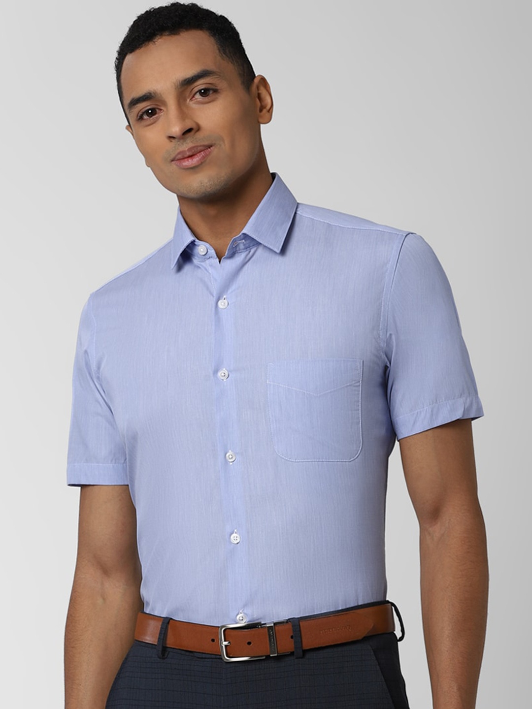 

Peter England Men Blue Slim Fit Solid Formal Shirt