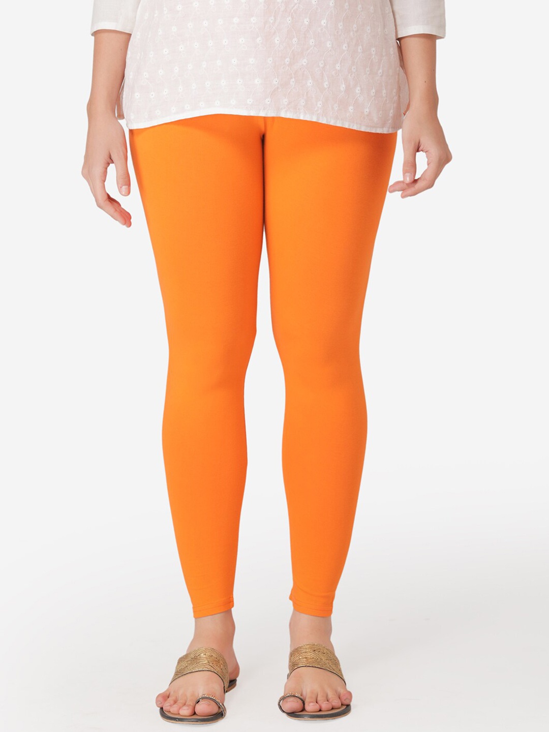 

Vami Women Orange Solid Cropped Leggings