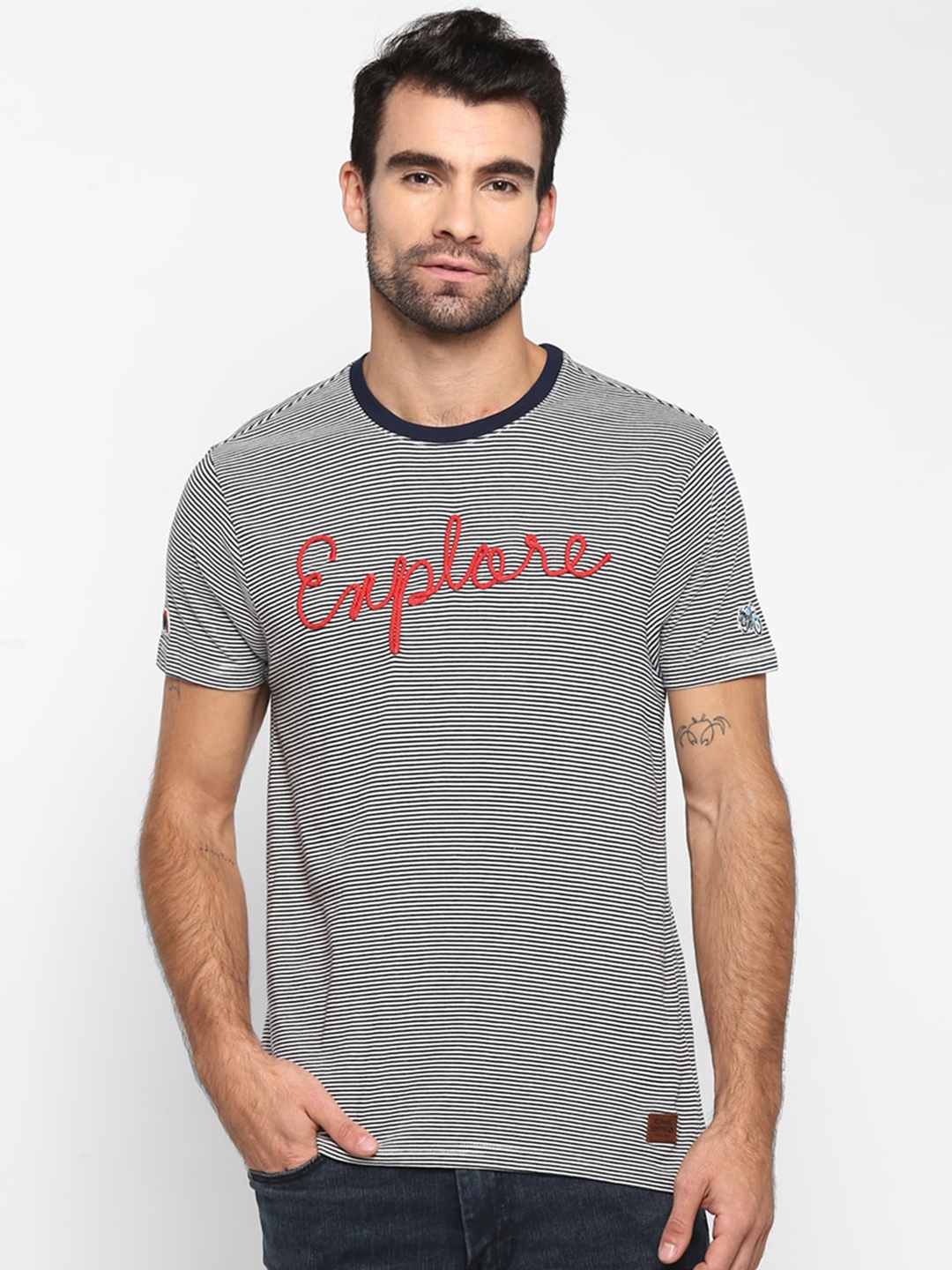 

Royal Enfield Men Navy Blue & White Striped Round Neck T-shirt