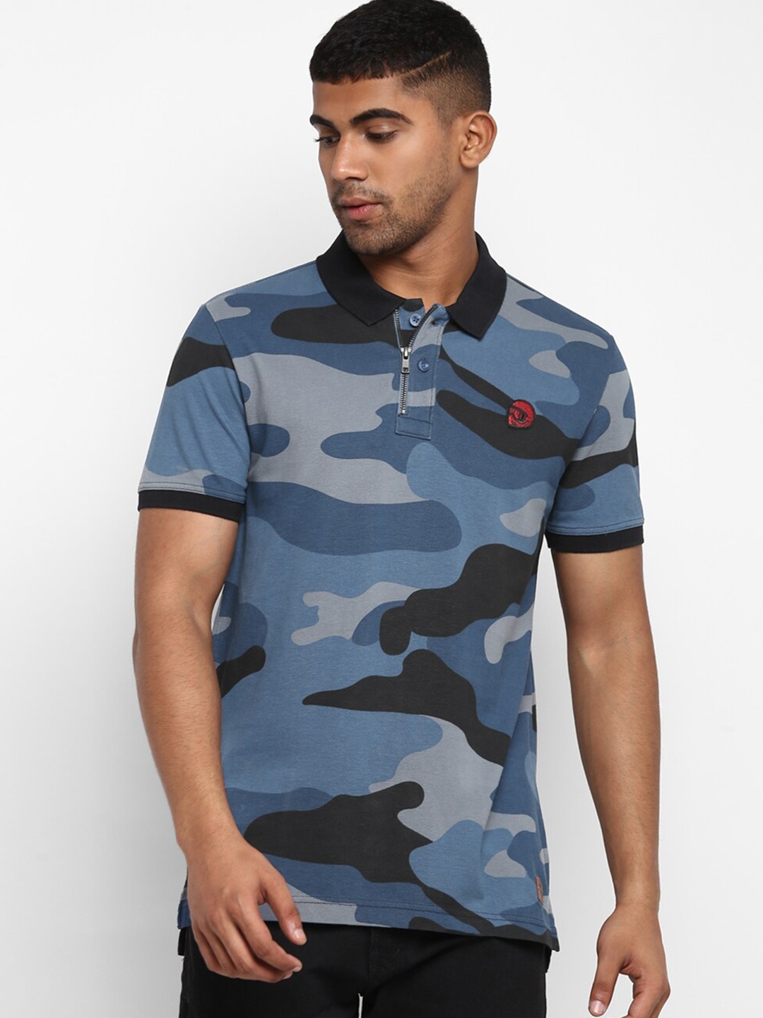 

Royal Enfield Men Blue & Black Printed Polo Collar T-shirt