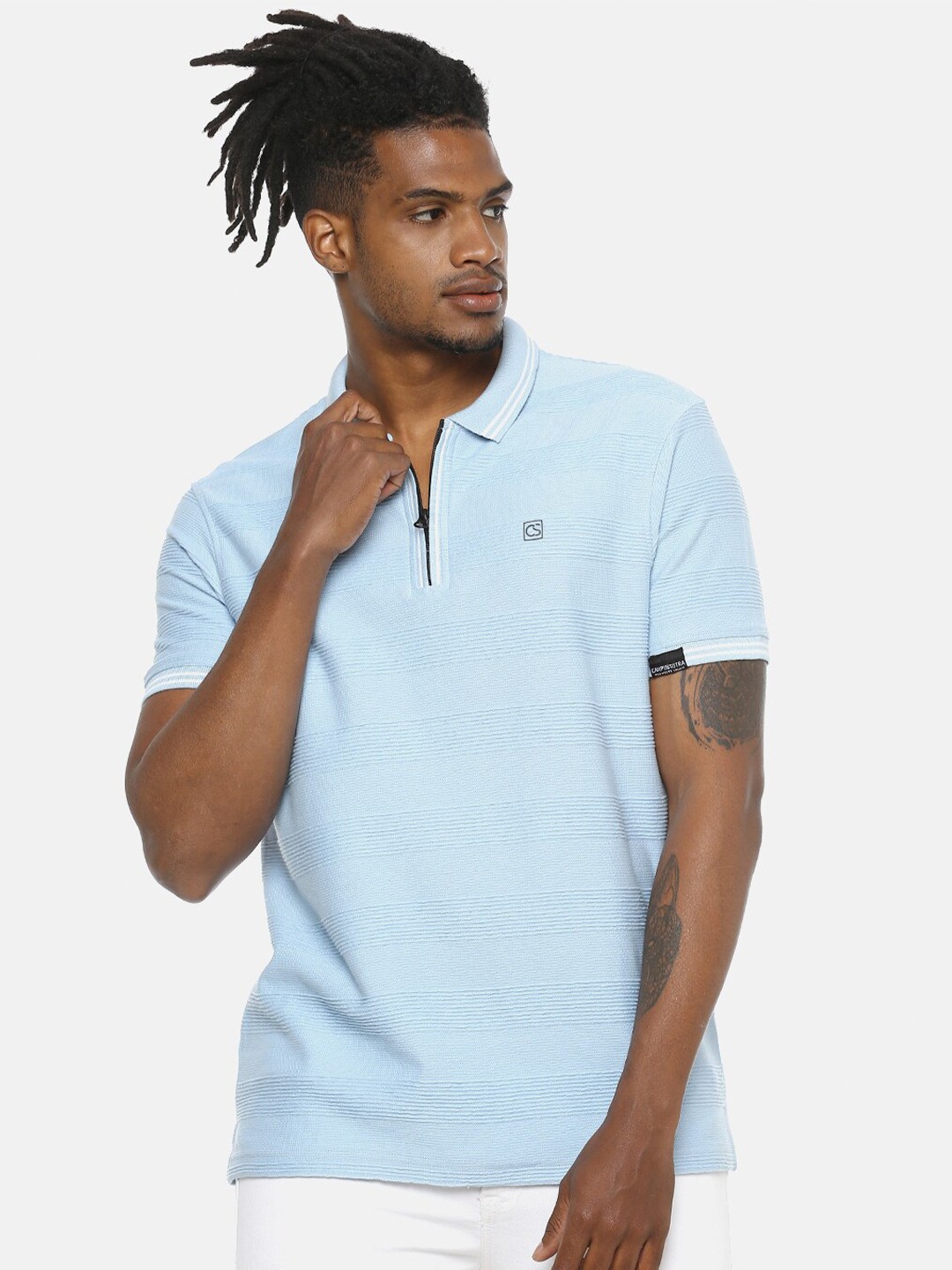 

Campus Sutra Men Blue Self Design Polo Collar Pure Cotton T-shirt