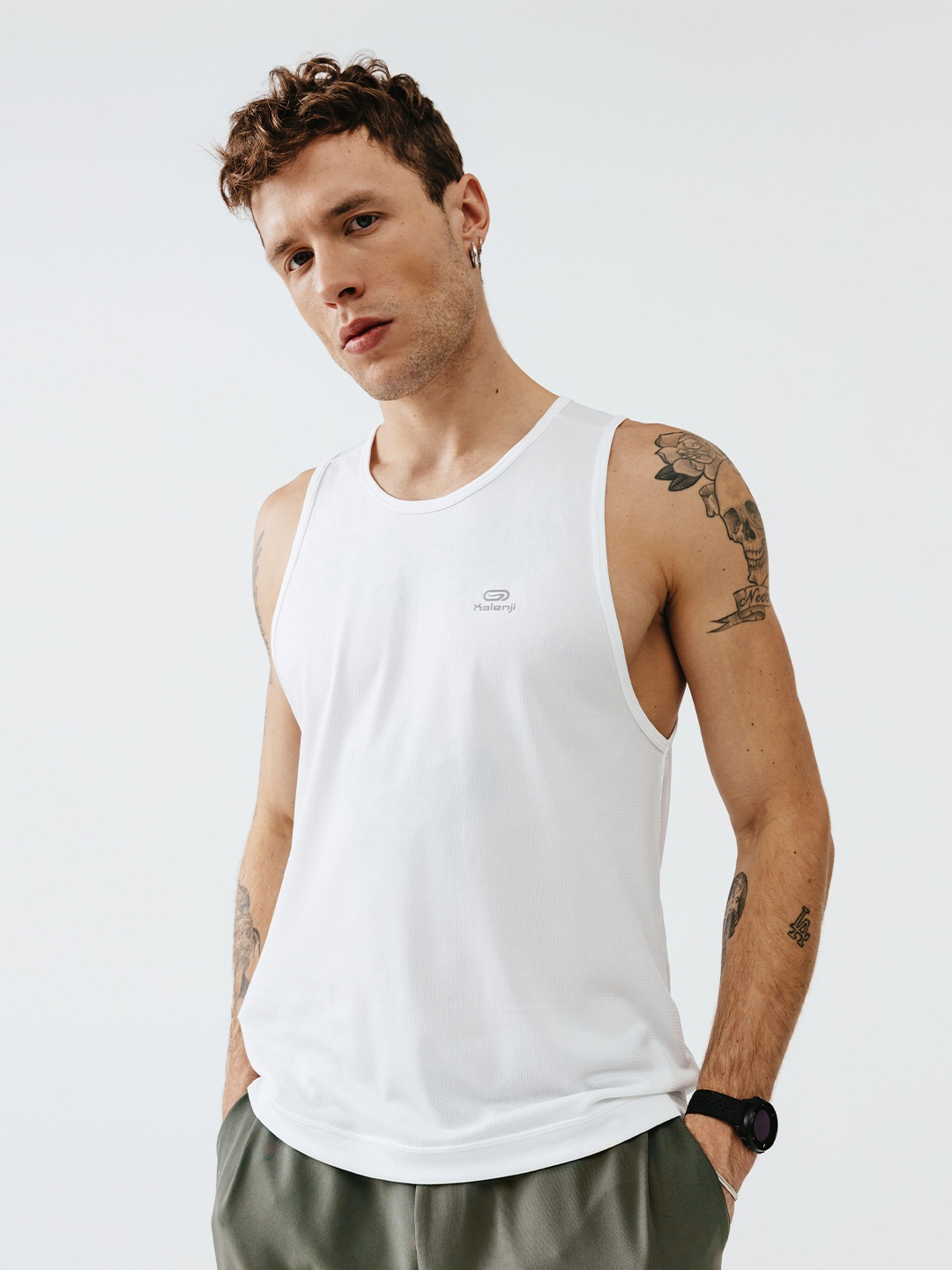 

Kalenji By Decathlon Men White Solid Round Neck Running T-shirt