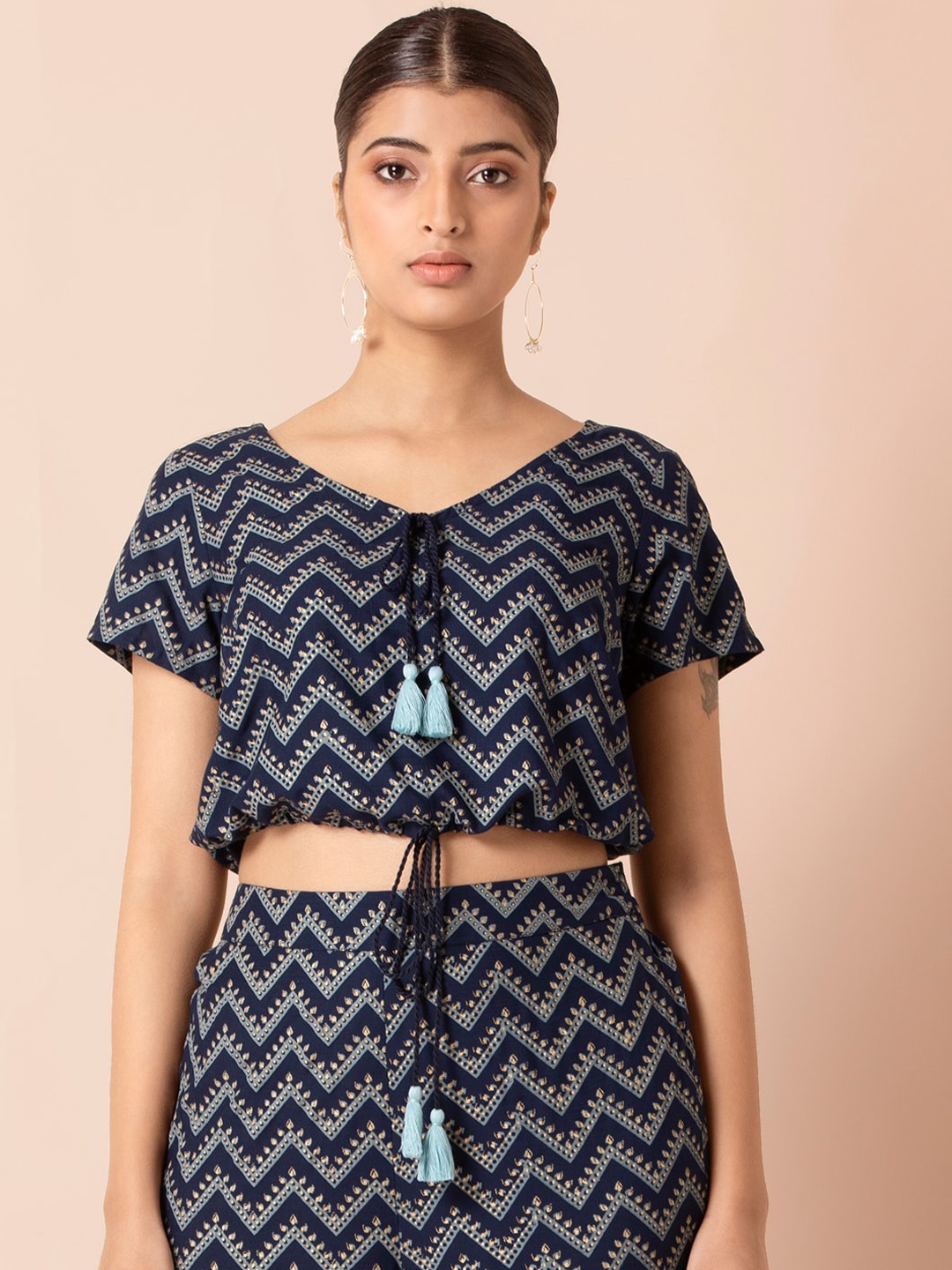

INDYA Blue Tie-Up Neck Drawstring Waist Crop Top