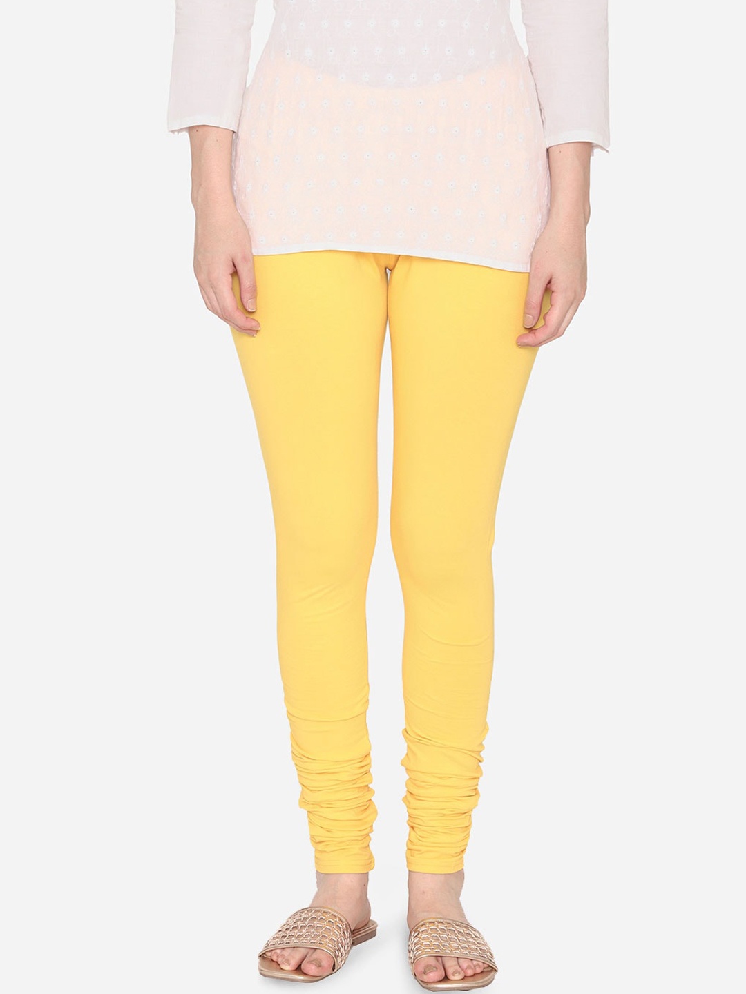 

Vami Women Yellow Solid Churidar-Length Stretchable Leggings