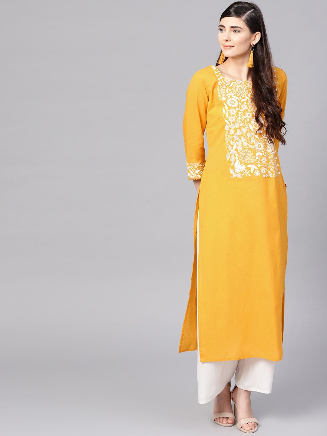 

Varanga Women Yellow Yoke Design Thread Work Kurta