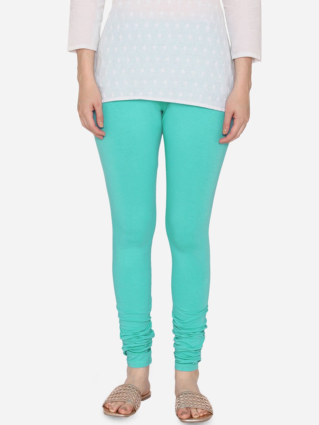 

Vami Women Turquoise Blue Solid Churidar-Length Stretchable Leggings