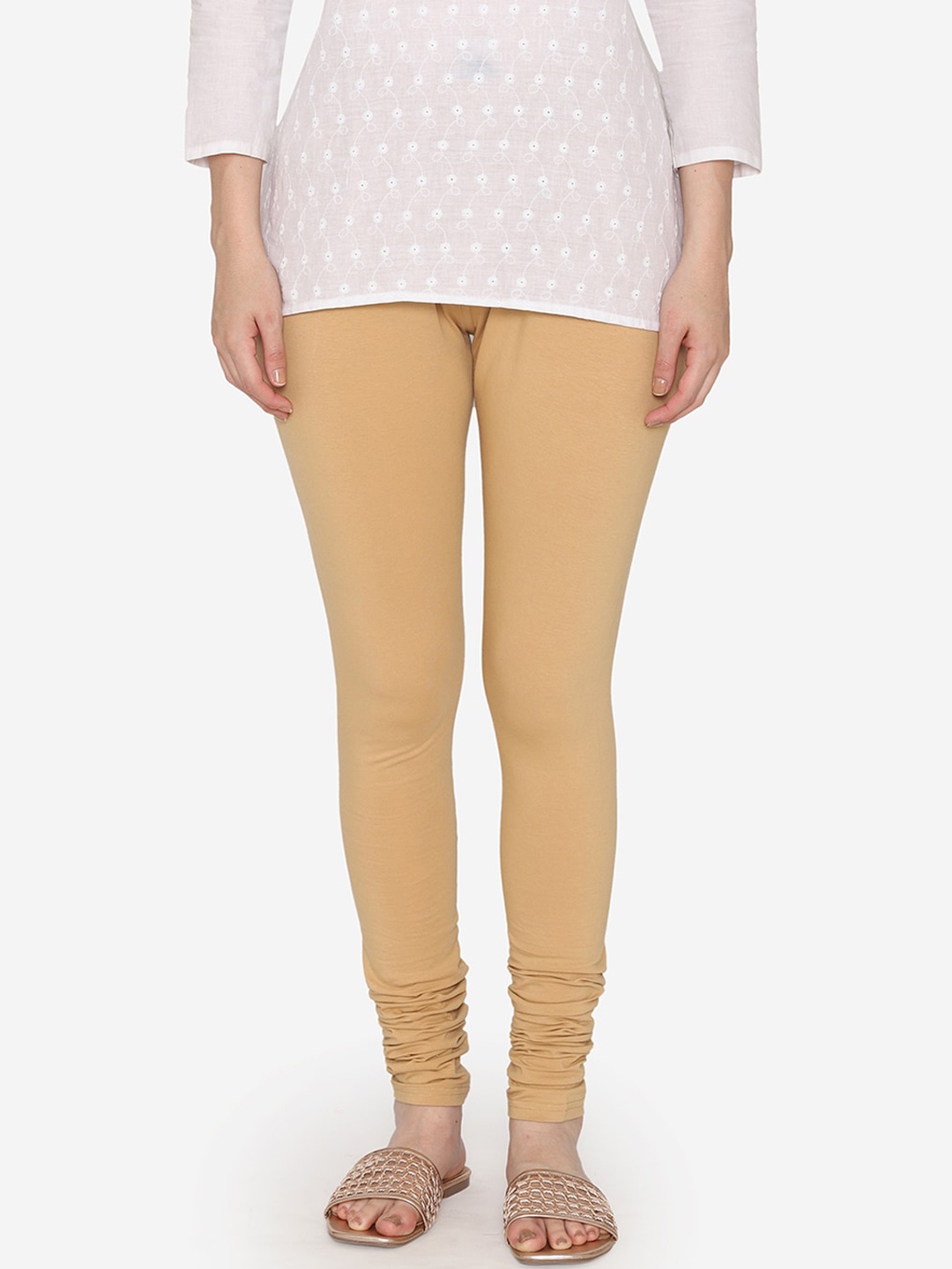 

Vami Women Beige Solid Churidar-Length Stretchable Leggings