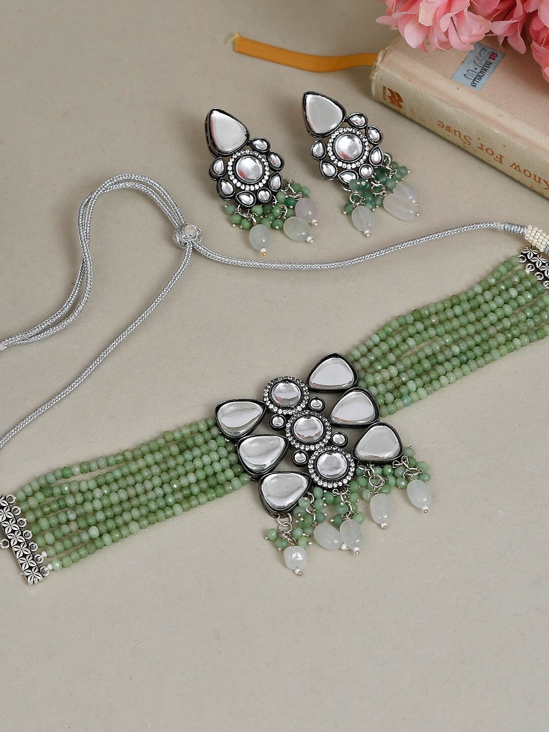 

Silvermerc Designs Lime Green & White Oxidized Silver-Plated Kundan Jewellery Set