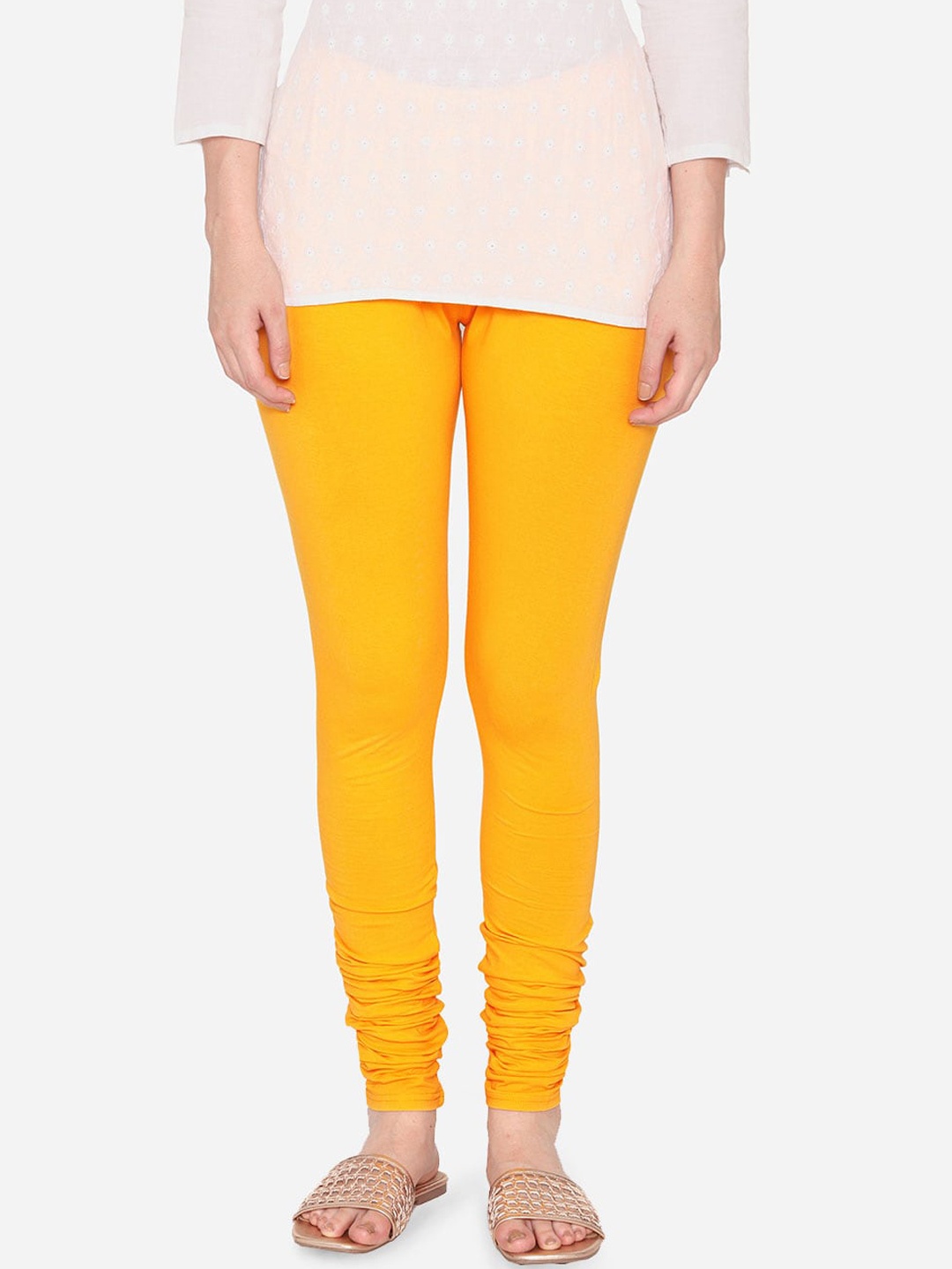 

Vami Women Yellow Solid Churidar-Length Stretchable Leggings