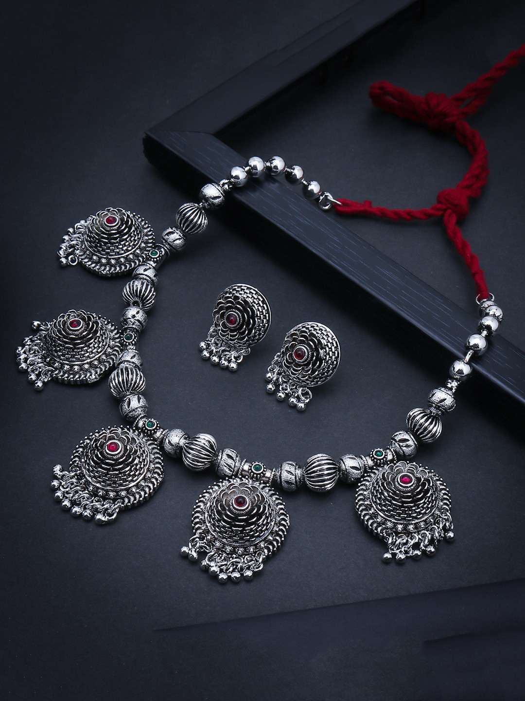 

Sukkhi Oxidised Rhodium-Plated Silver-Toned & Red Stone-Studded Jewellery Set