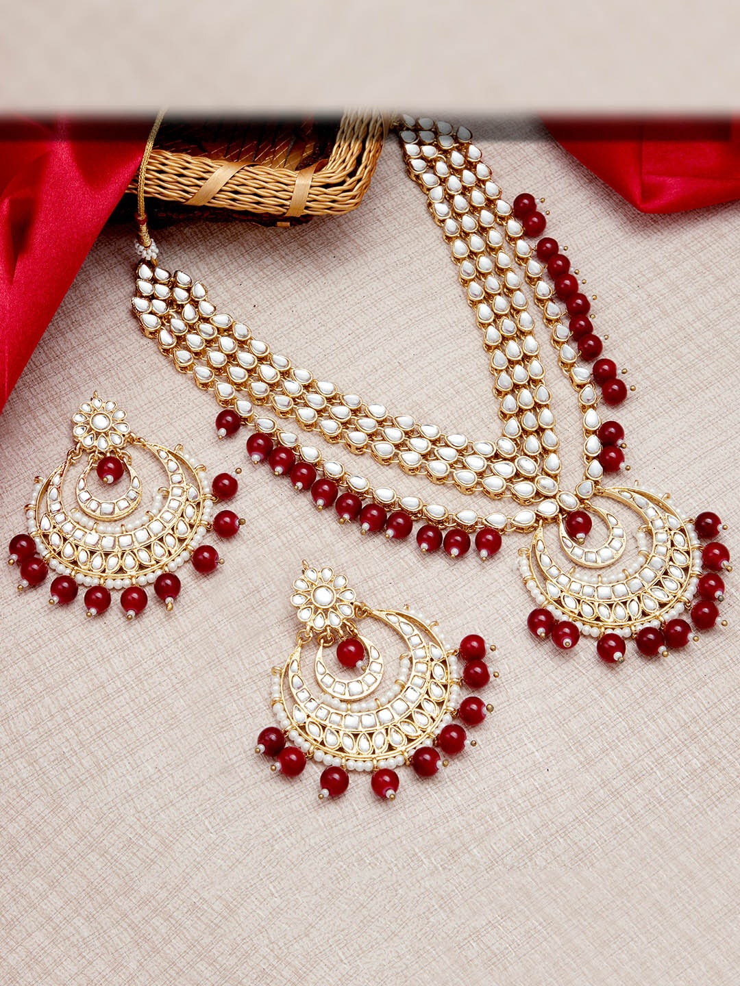 

Sukkhi Gold-Plated Maroon & White Kundan-Studded & Pearl Beaded Jewellery Set