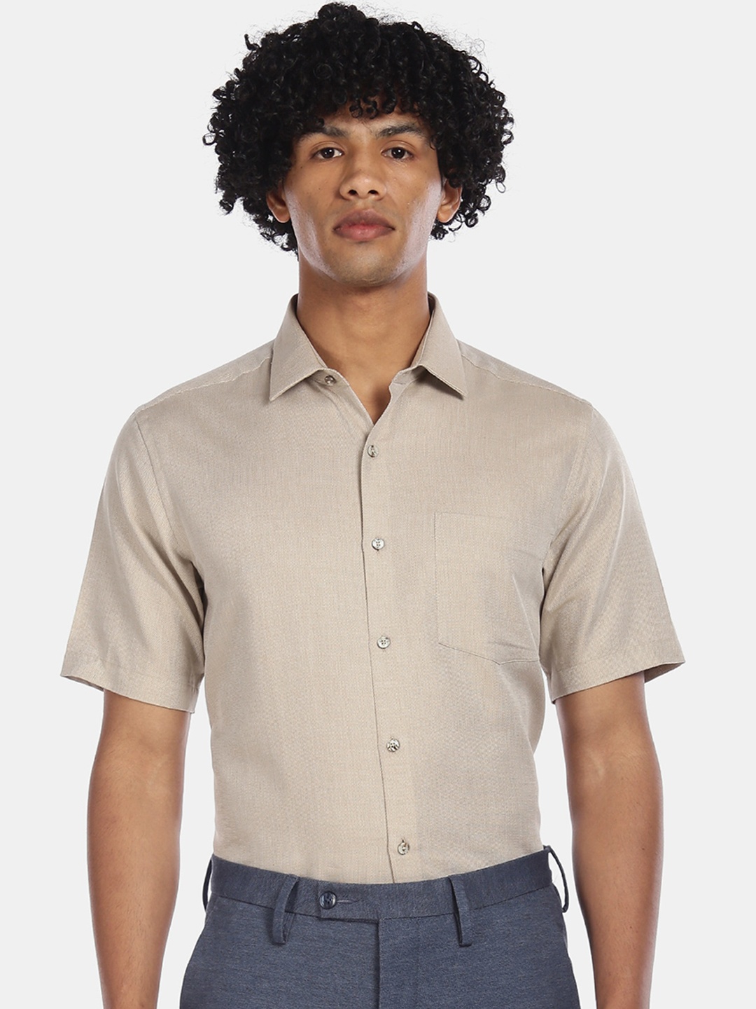 

Arrow Men Beige Regular Fit Solid Semiformal Shirt