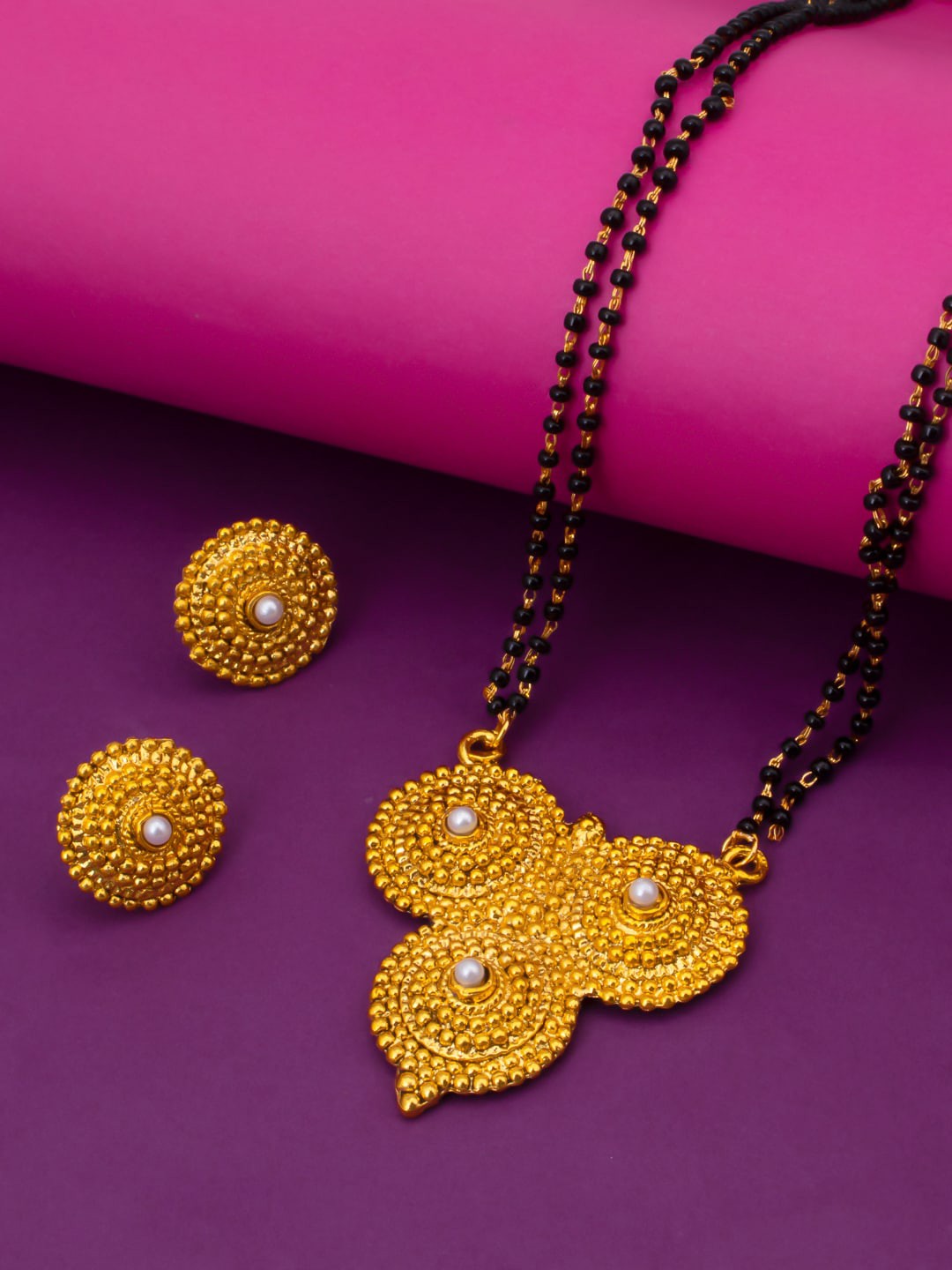 

Sukkhi Gold-Plated Black Beaded Pearl Studded Mangalsutra With Earrings