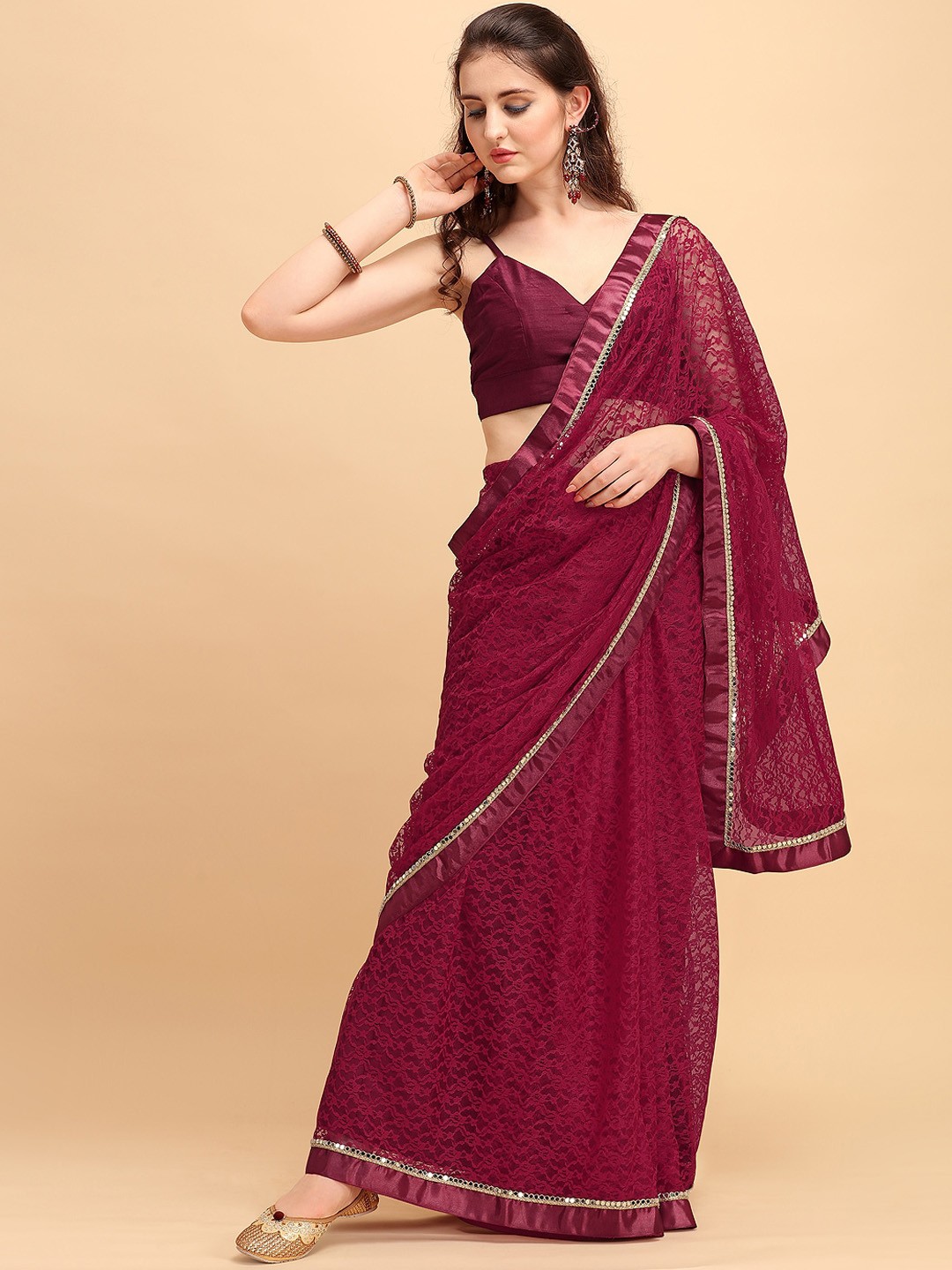 

Sangria Maroon Woven Design Net Saree
