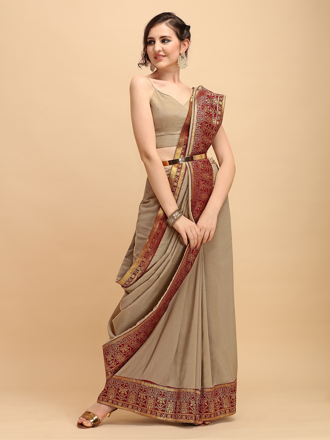 

Sangria Beige Solid Silk Blend Saree