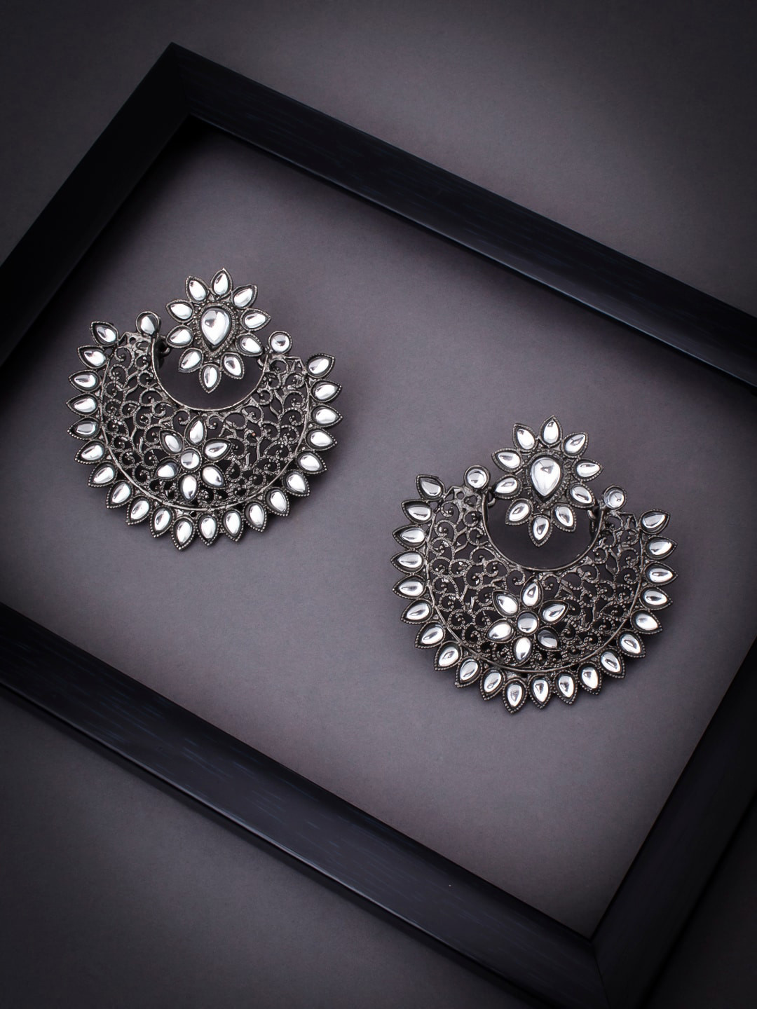 

Sukkhi Silver & Rhodium-Plated Crescent Shaped Chandbalis Earrings