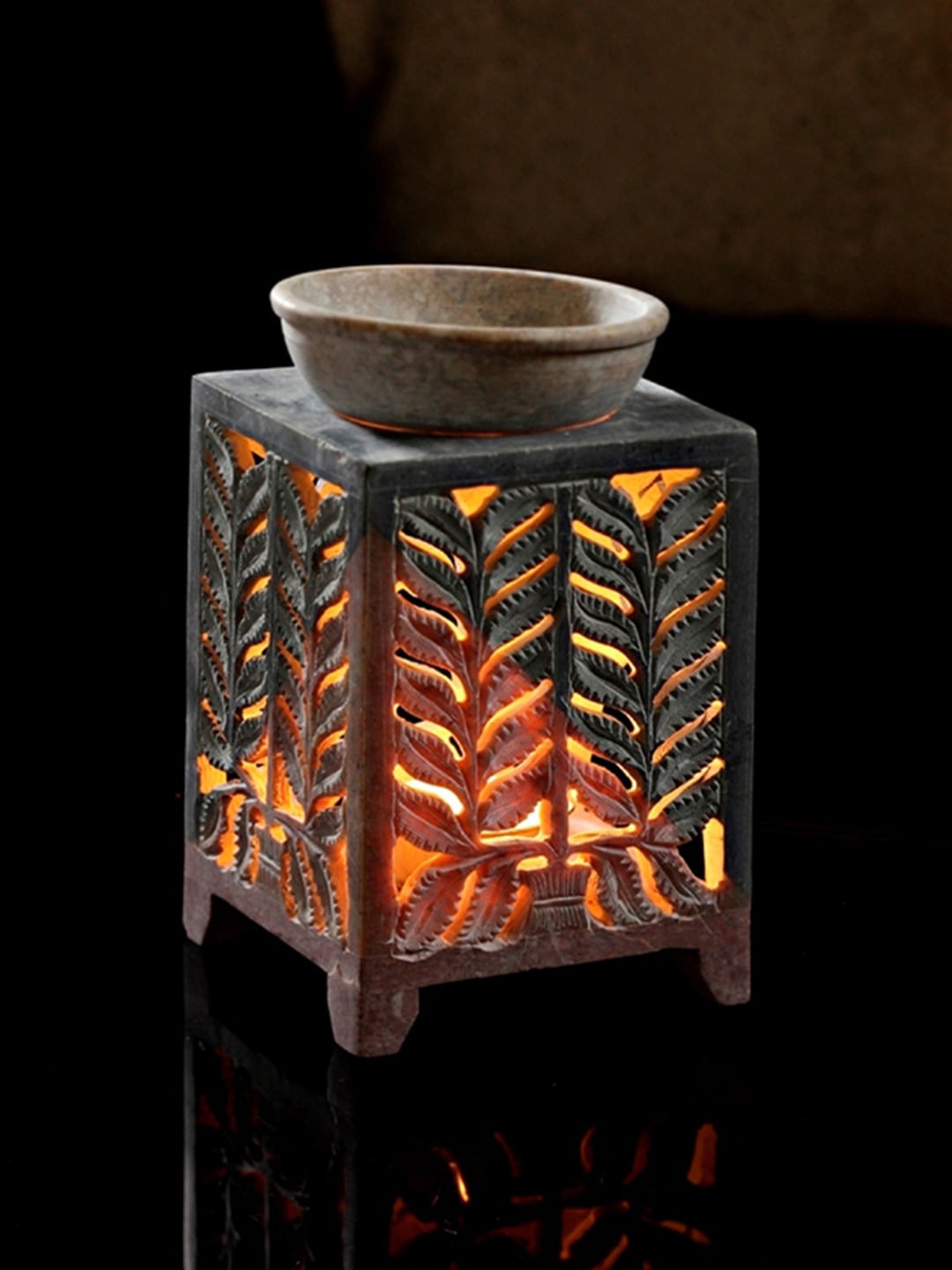 

Aapno Rajasthan Grey Hand-Carved Tea Light Holder With Aroma Oil Burner