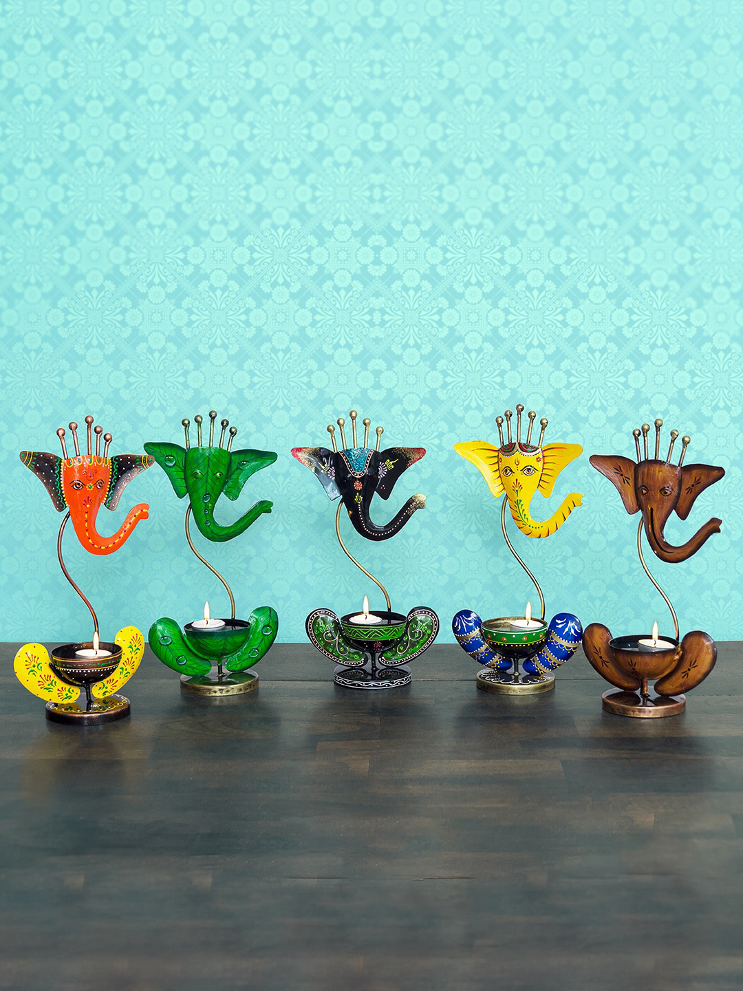 

Golden Peacock Set of 5 Handcrafted Iron Ganesha Tea Light Candle Holder, Multi