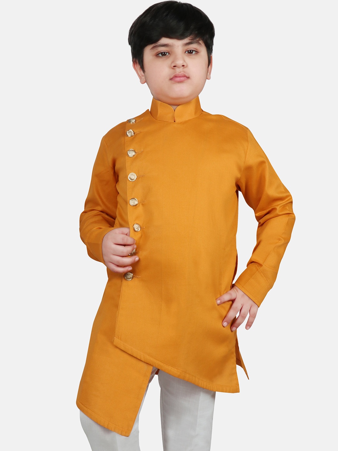 

SG YUVRAJ Boys Mustard Asymmetric Raw Silk Kurta