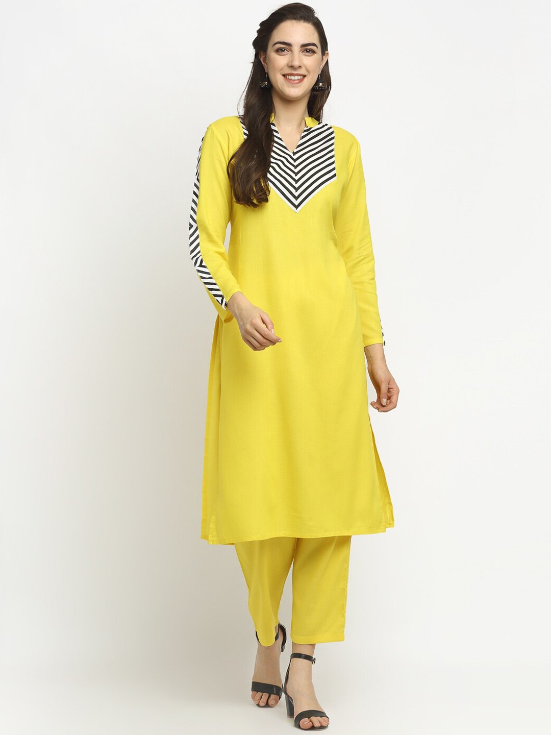 

Rudra Bazaar Women Yellow Yoke Design Regular A-Line Kurti with Trousers