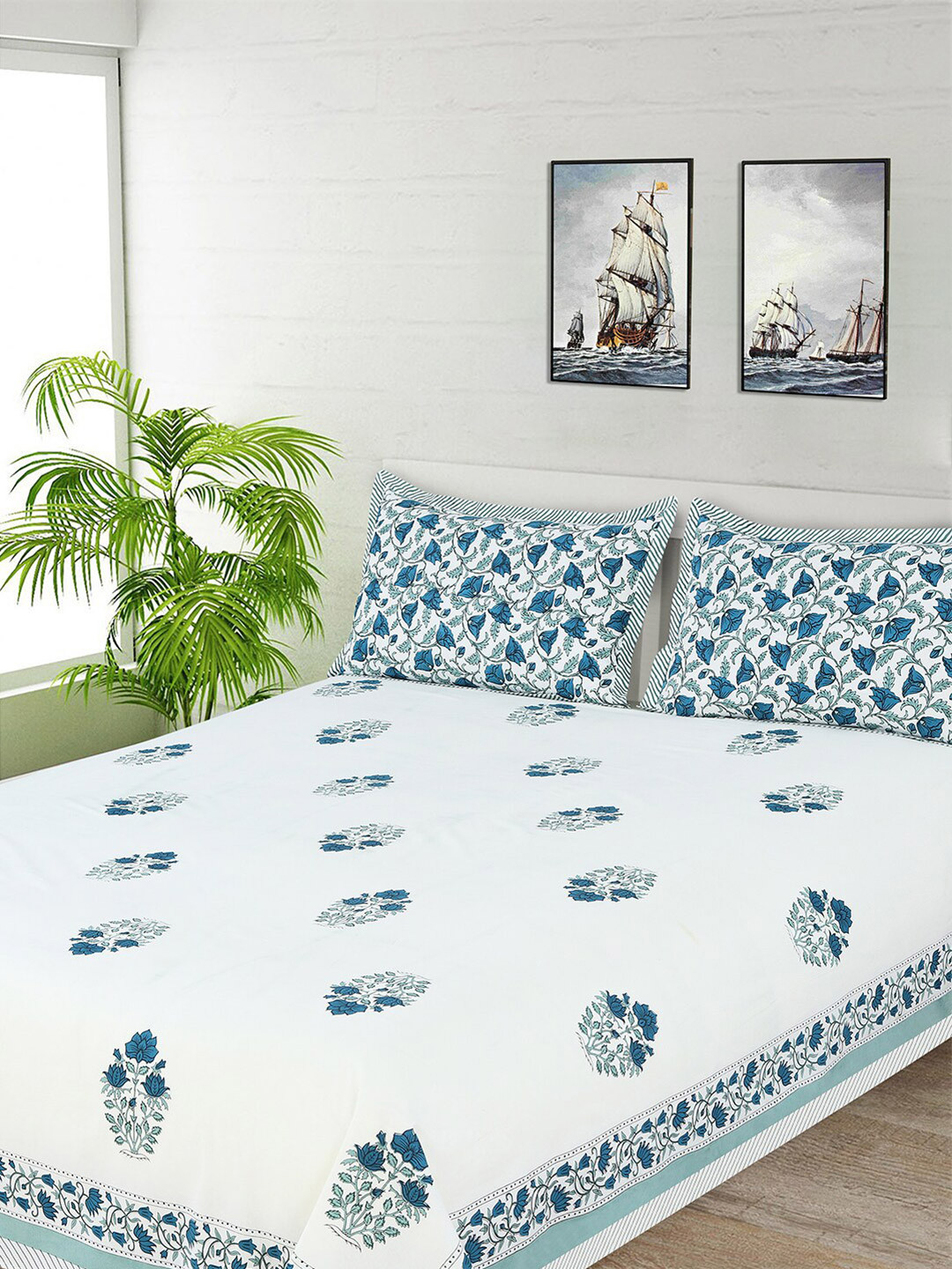

Salona Bichona White & Blue Floral 144 TC Cotton 1 Queen Bedsheet with 2 Pillow Covers