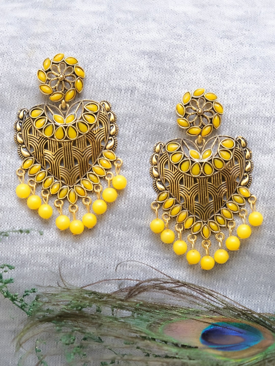

Crunchy Fashion Gold-Toned & Yellow Contemporary Chandbalis