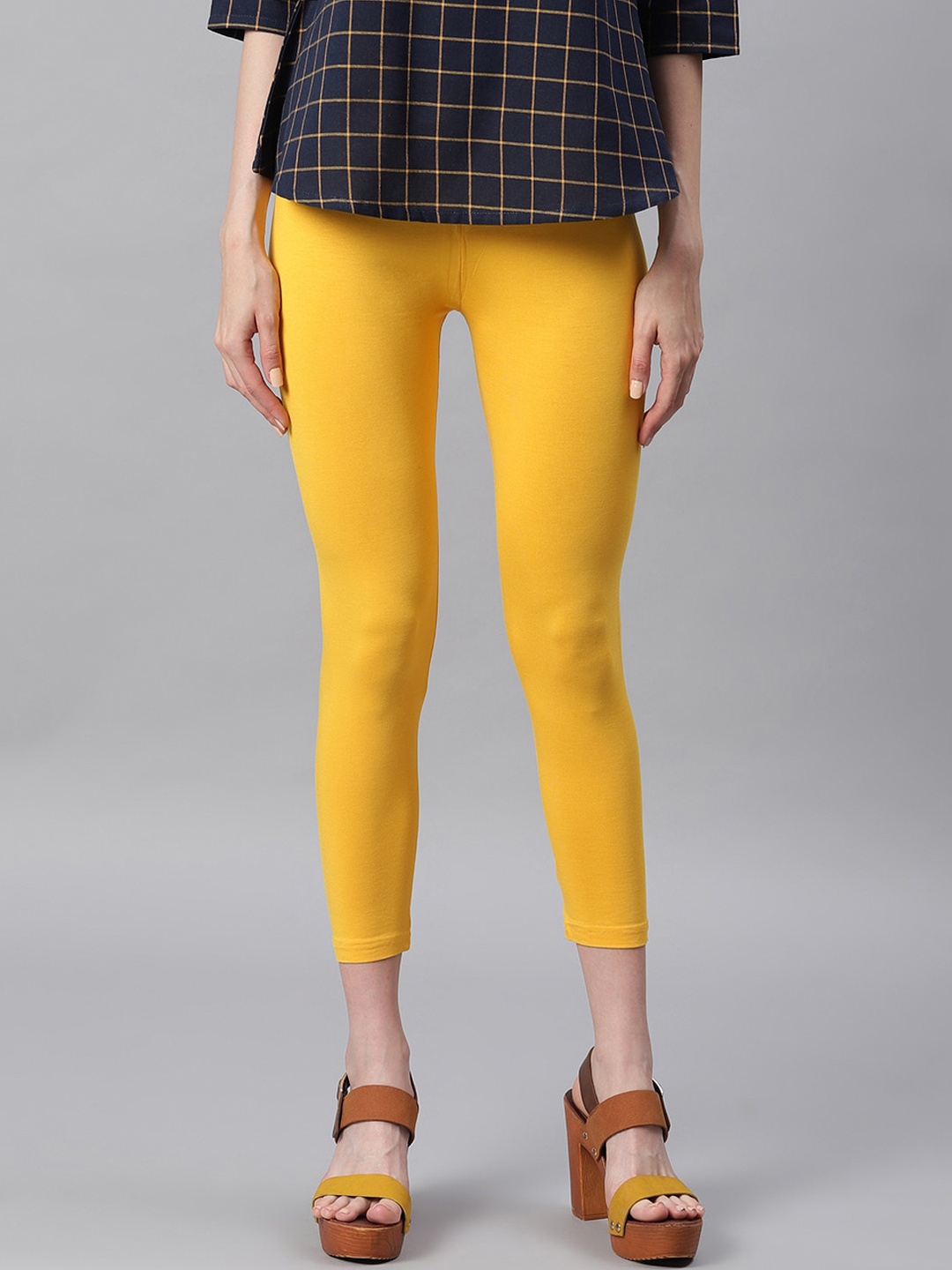 

Janasya Women Yellow Solid Ankle-Length Leggings