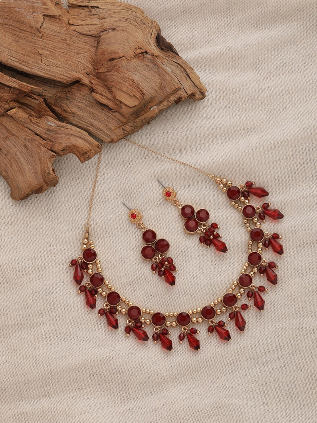 

Accessorize Gold-Plated Red Stone-Studded & Beaded Jewellery Set