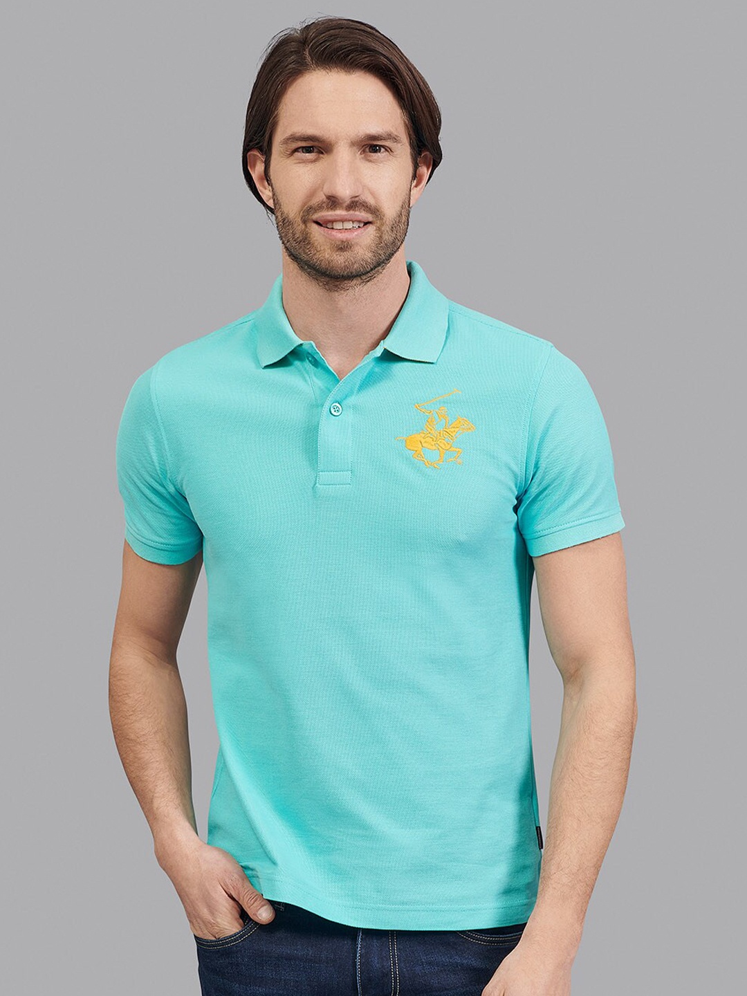 

Beverly Hills Polo Club Men Blue Solid Polo Collar T-shirt
