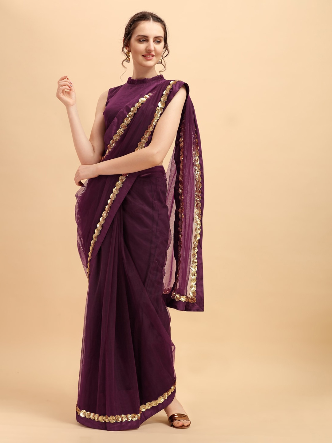 

Sangria Purple & Golden Embellished Sequinned Net Saree