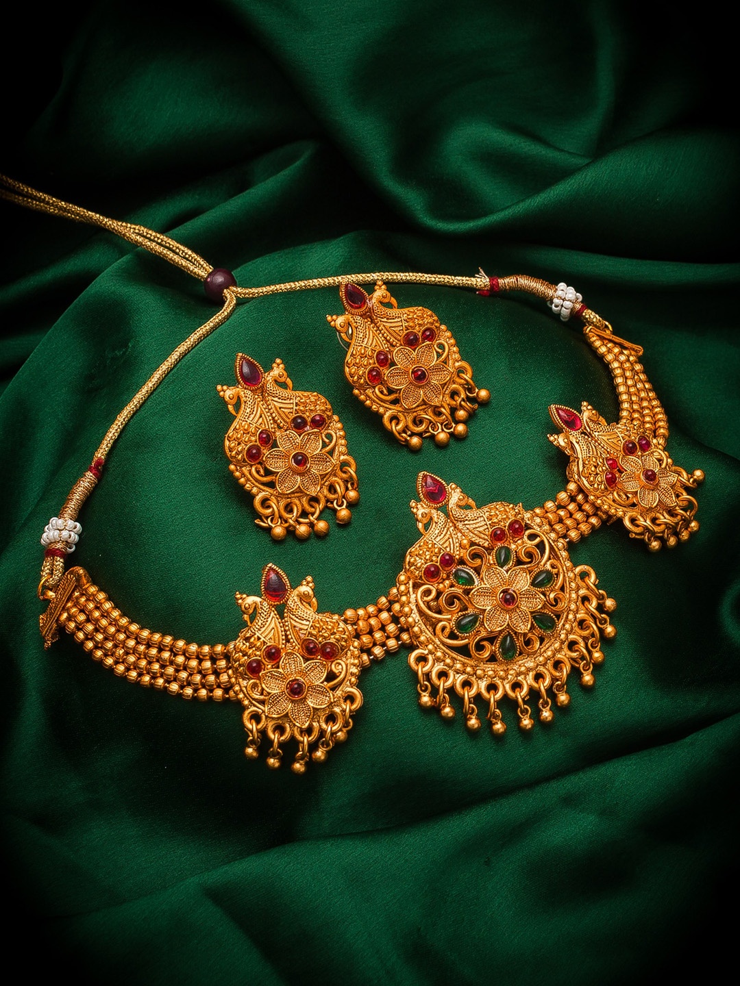 

aadita Gold-Plated Pink & Green Stone-Studded & Beaded Temple Jewellery Set