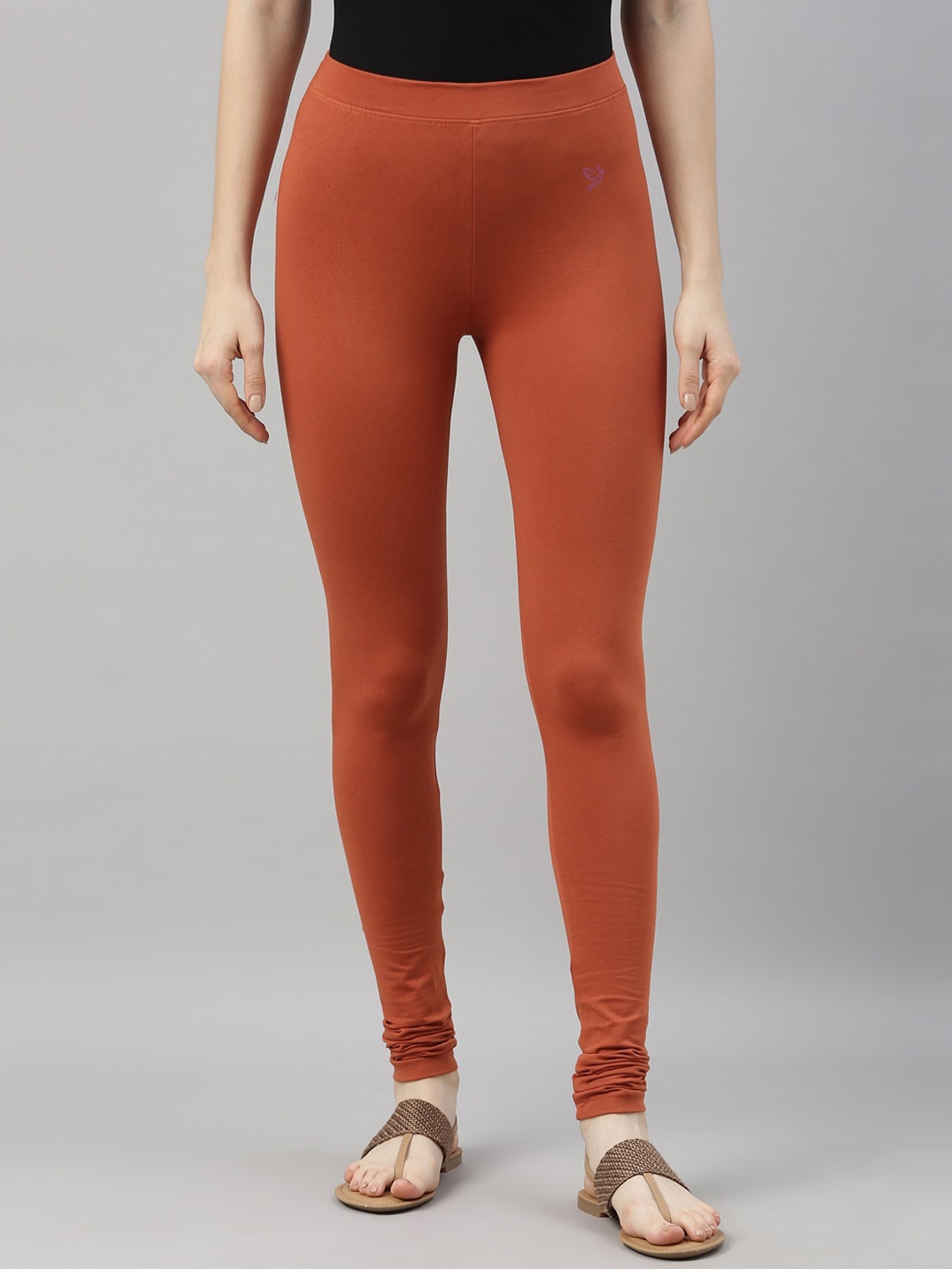 

TWIN BIRDS Women Rust Orange Solid Churidar Length Leggings