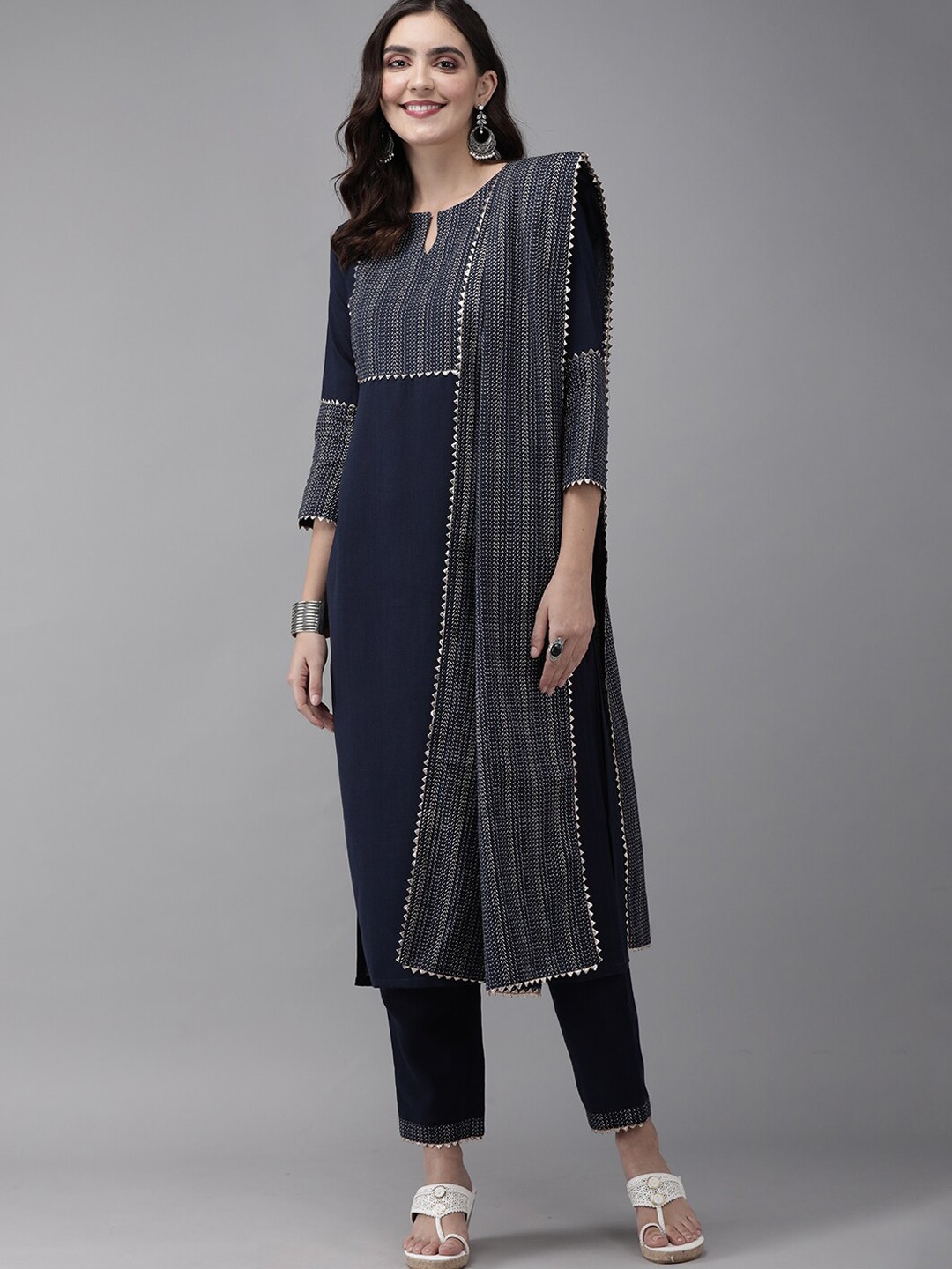 

Indo Era Women Navy Blue Solid Straight Kurta with Trousers & With Dupatta