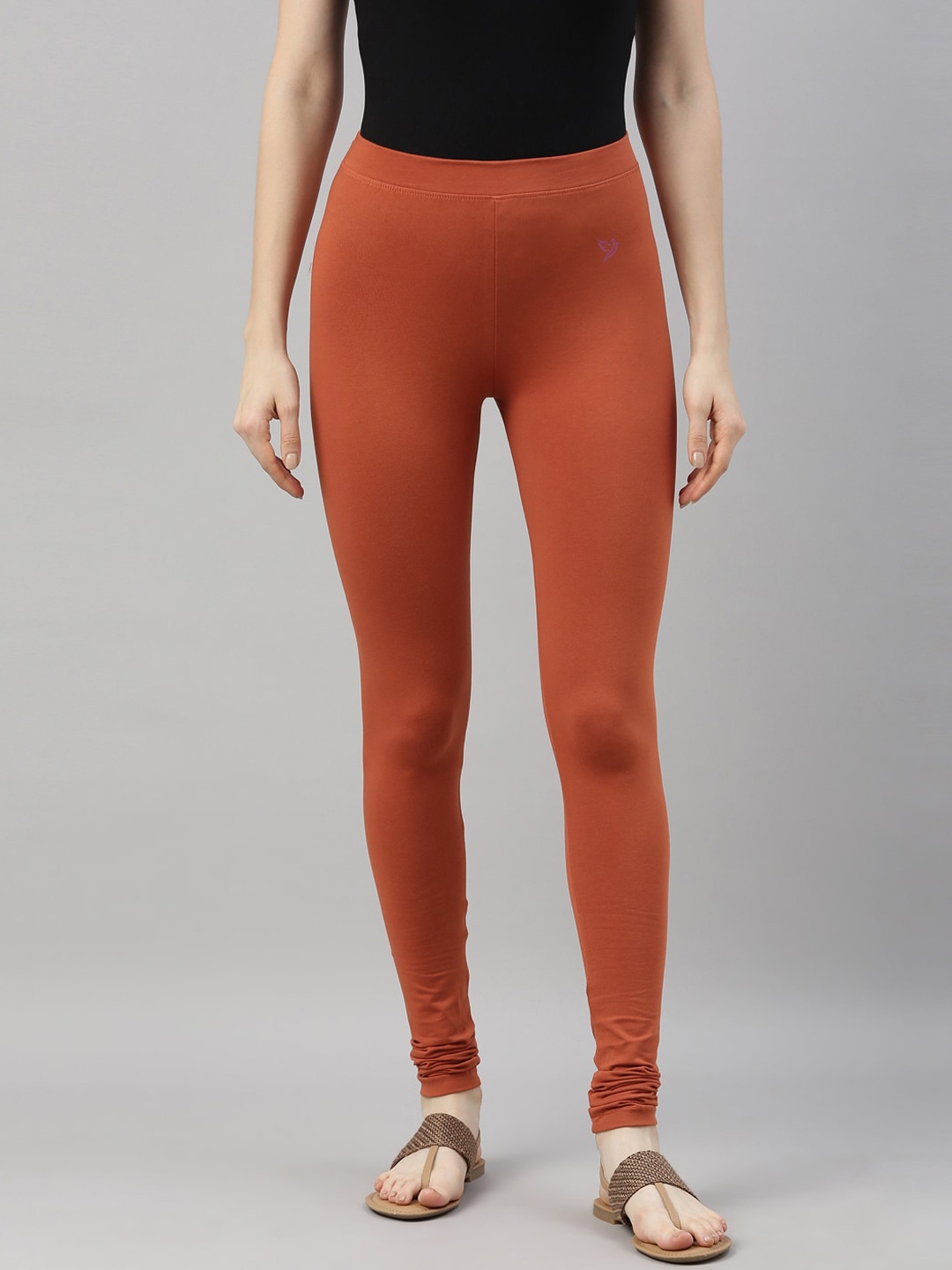 

TWIN BIRDS Women Rust Orange Solid Churidar Length Leggings