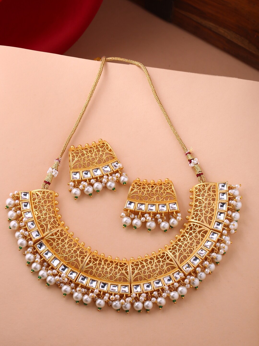 

Shoshaa Gold-Plated White Handcrafted Artificial Stones-Studded Jewellery Set