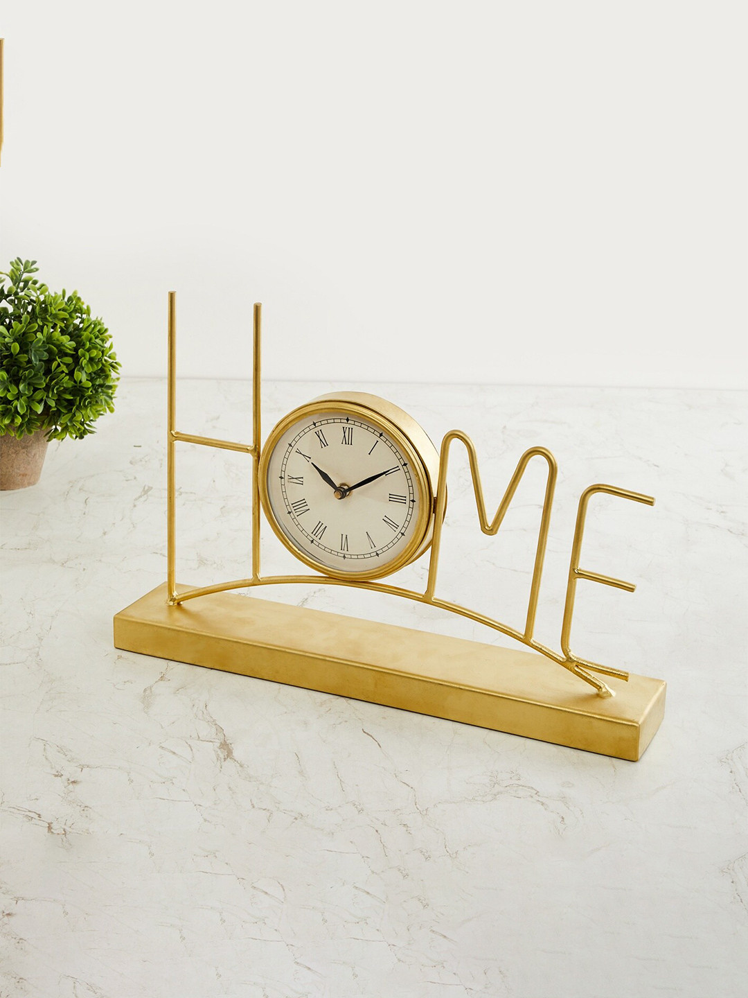 

Home Centre Gold & White Quirky Contemporary Wall Clock
