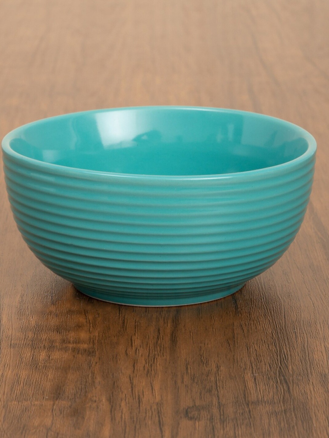 

Home Centre Turquoise Blue Striped Curry Serving Bowl