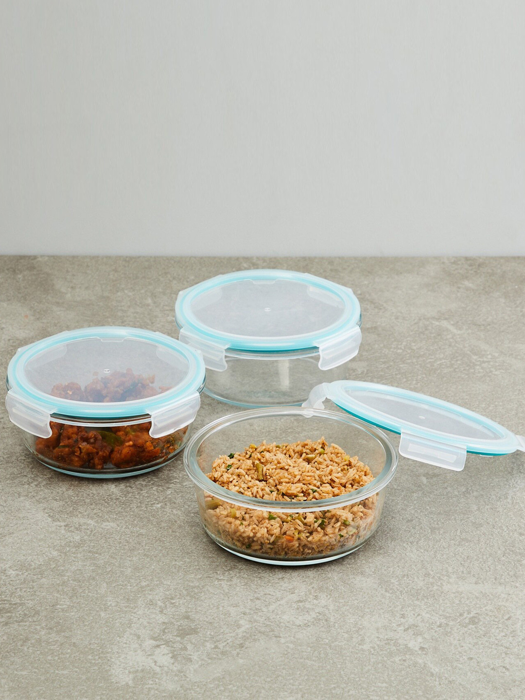 

Home Centre Set Of 3 Transparent Solid Round Leak Proof Borosilicate Glass Food Containers, Blue
