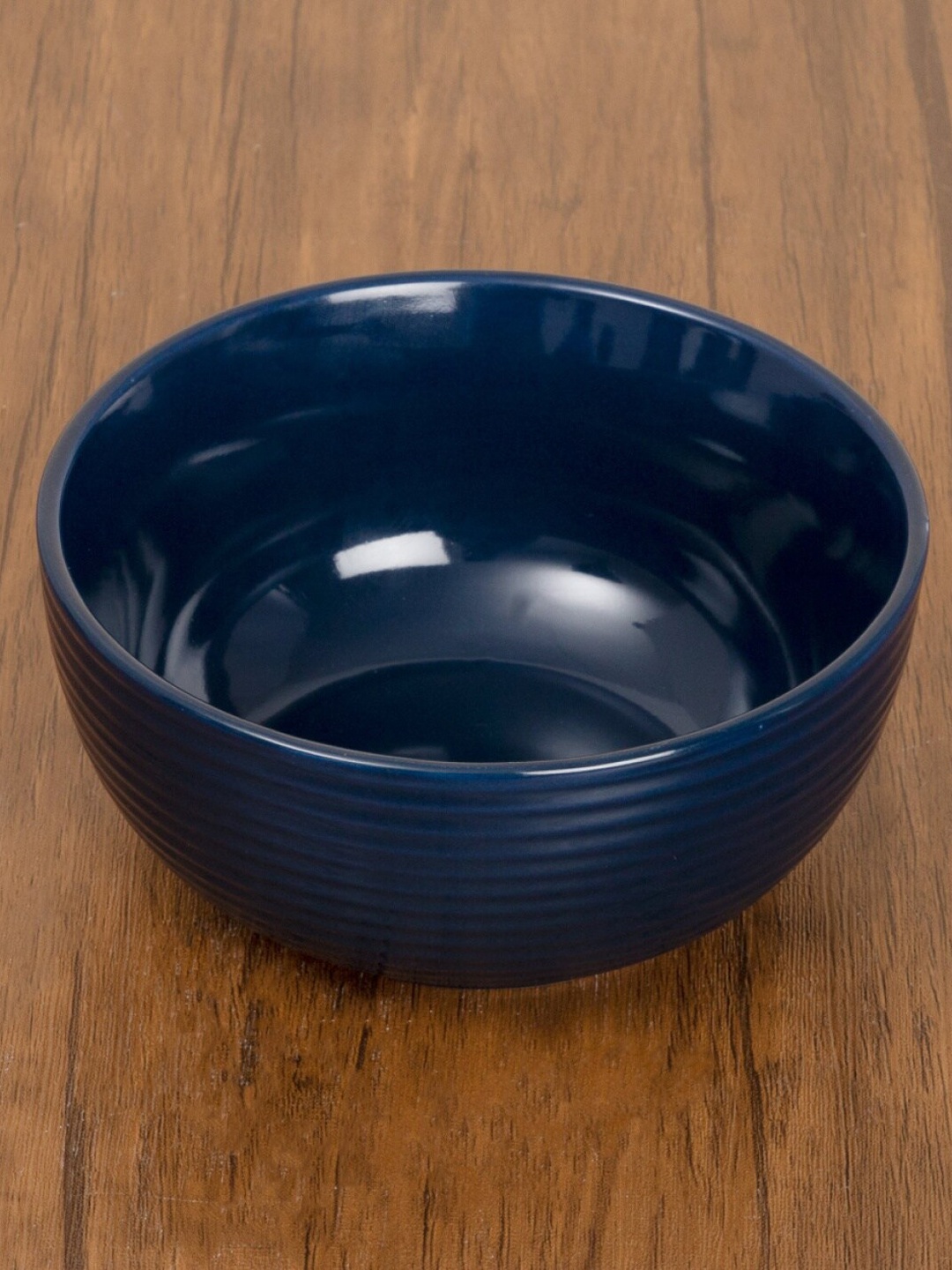 

Home Centre Blue Solid Curry Bowl