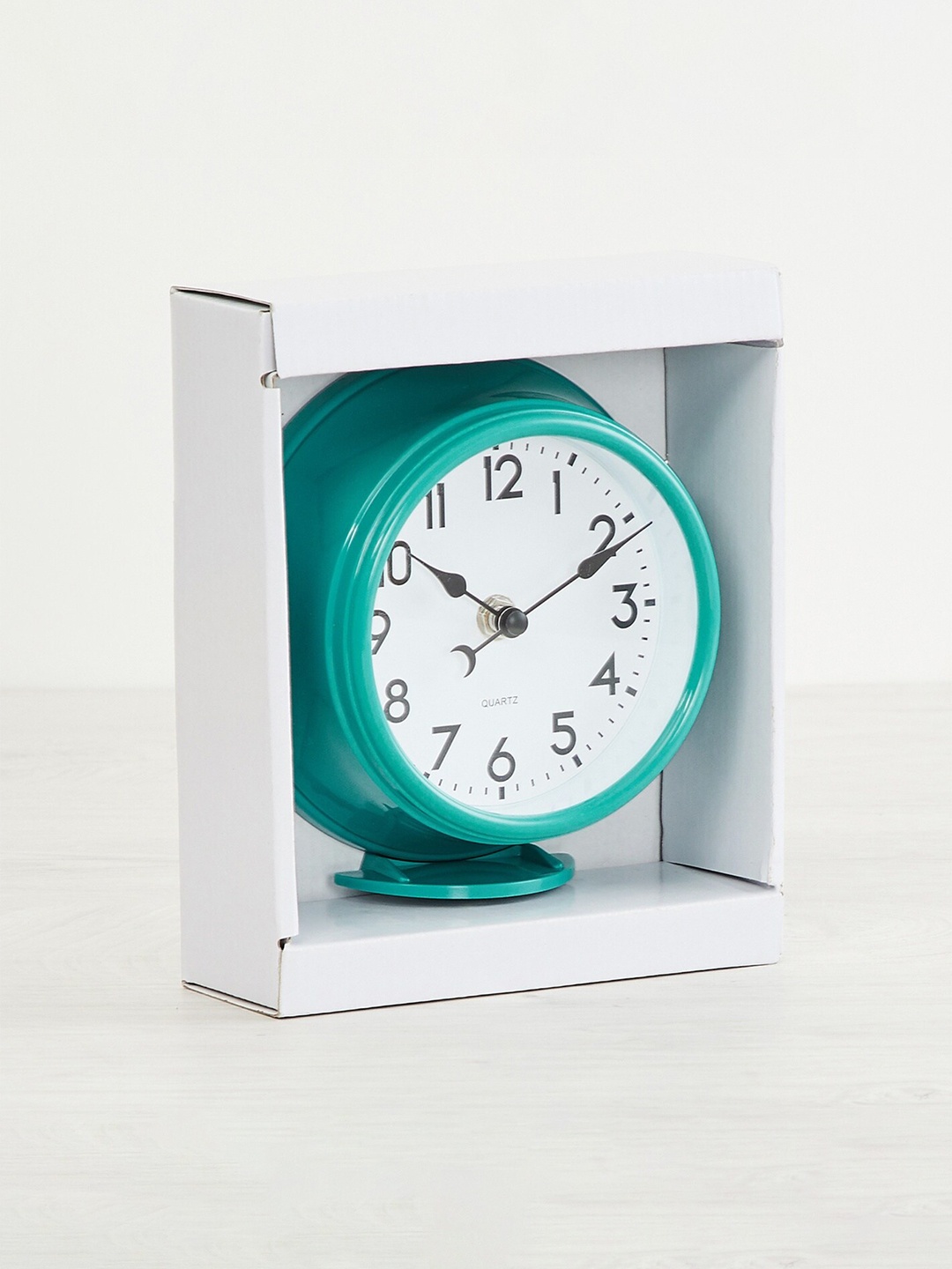 

Home Centre White & Blue Contemporary Table Clock