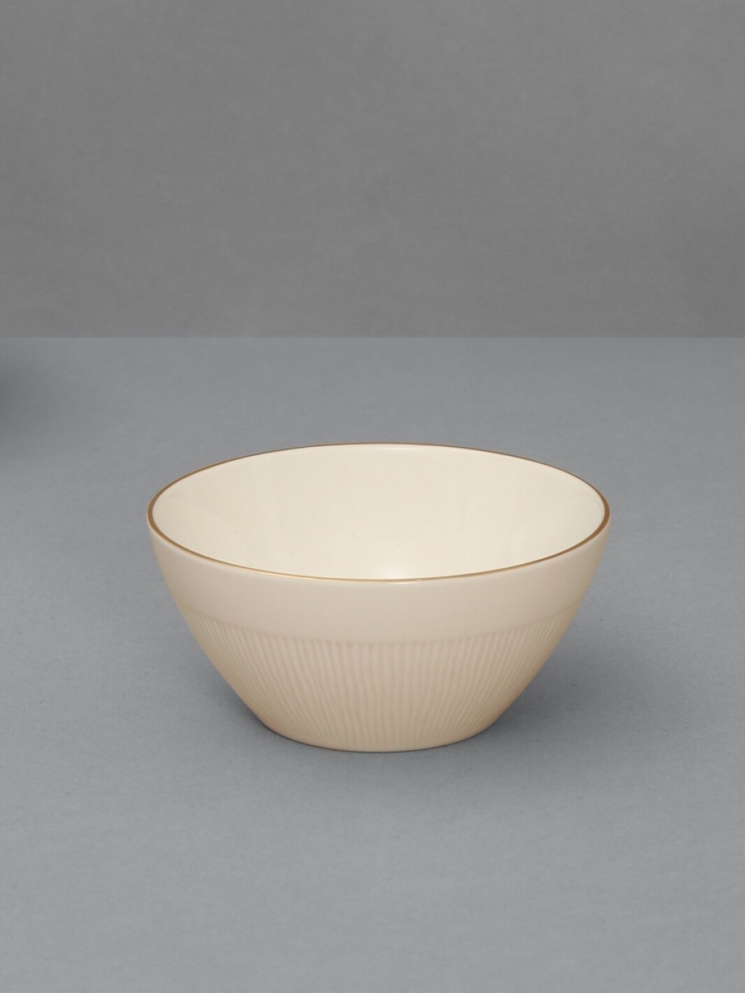 

Home Centre Beige Solid Altius Neo Silk Salad Bowl
