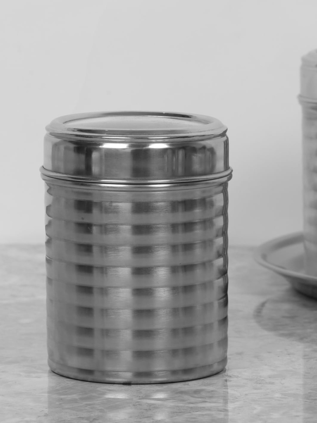 

Home Centre Silver-Toned Striped Stainless Steel Canister with Matt Finish