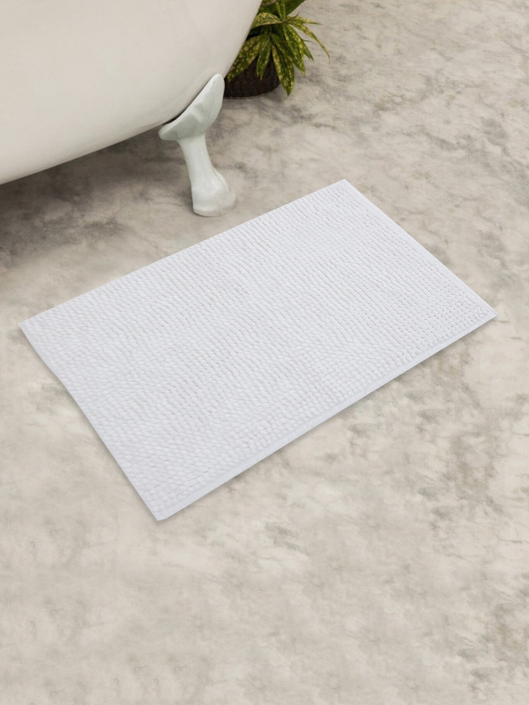 

Home Centre White Solid Marshmallow Poppy Bath Anti-Skid Mat