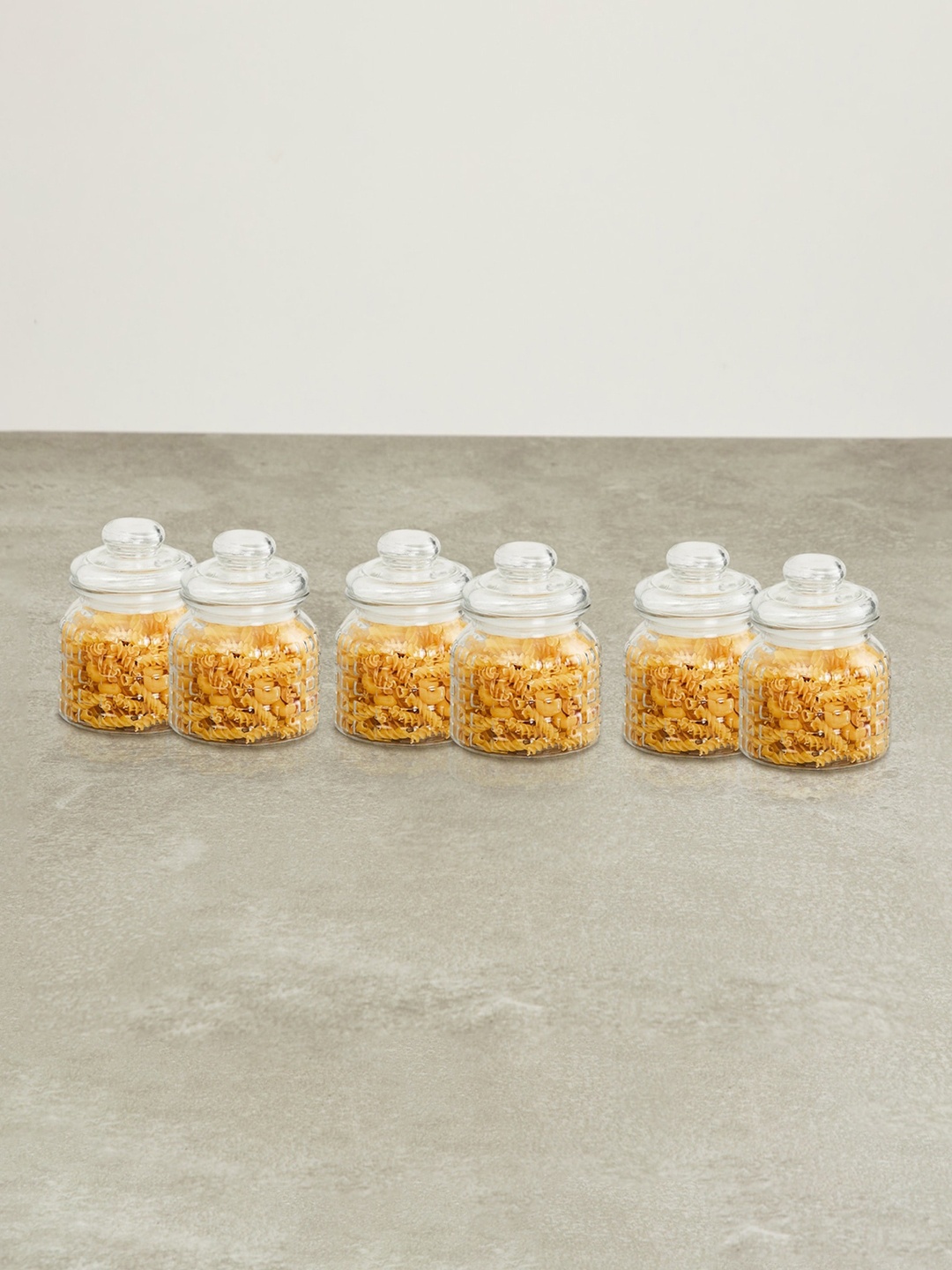 

Home Centre Set Of 6 Transparent Textured Storage Jars