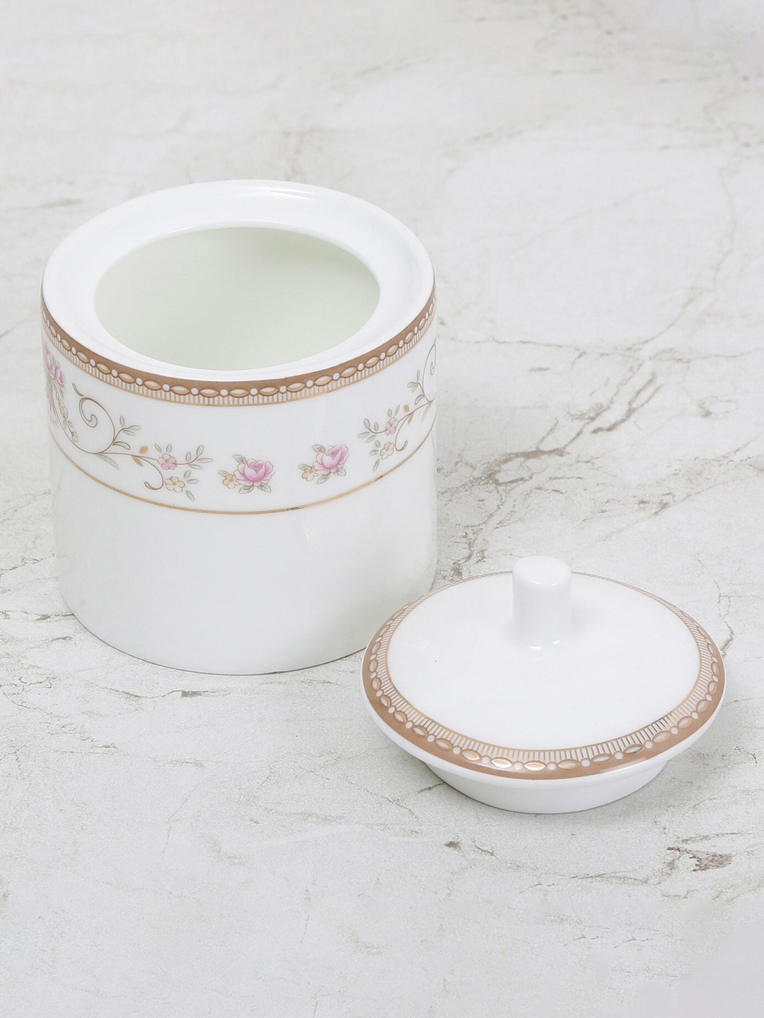 

Home Centre White & Pink Printed Bone China Kettle