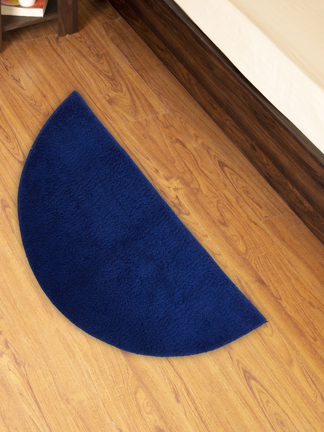 

Home Centre Assorted Solid Semi-Circular Bath Mat